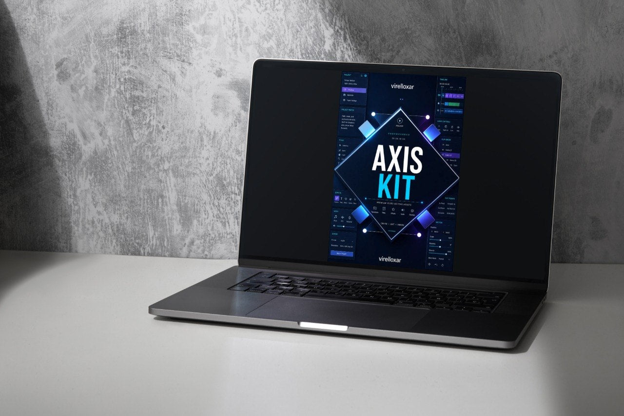 Laptop on a gray surface with a concrete wall background